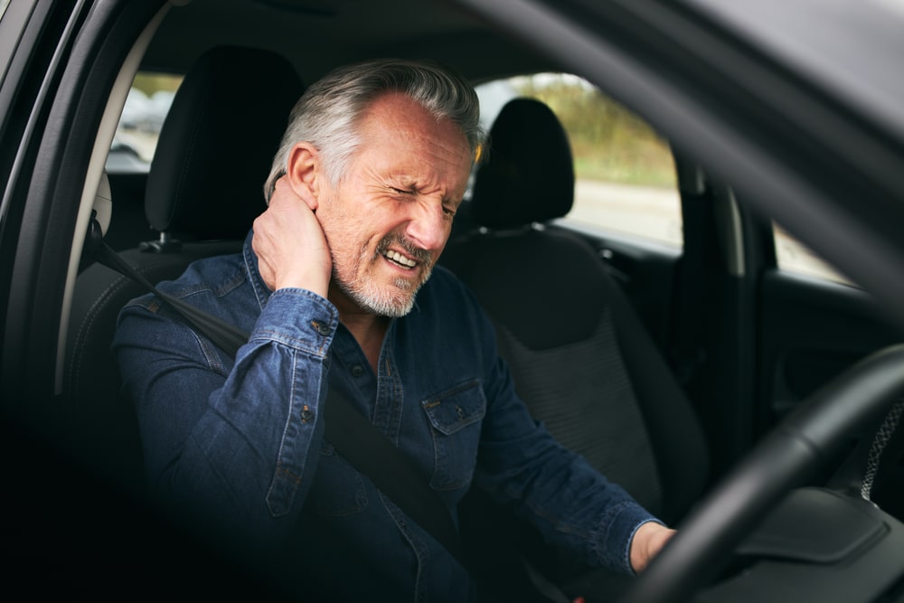 Man Inside of a car after car accident